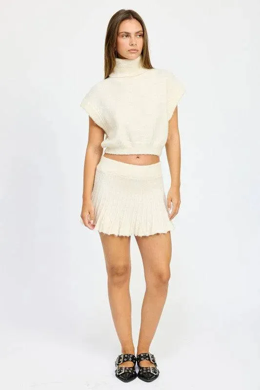 PLEATED MINI FRINGE SKIRT